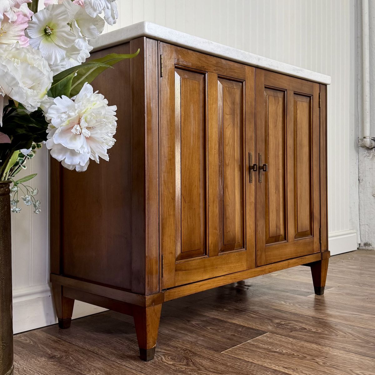 Left angle view of vintage Mid Century Brandt Marble Top Cabinet available in Salt Lake City Utah. 