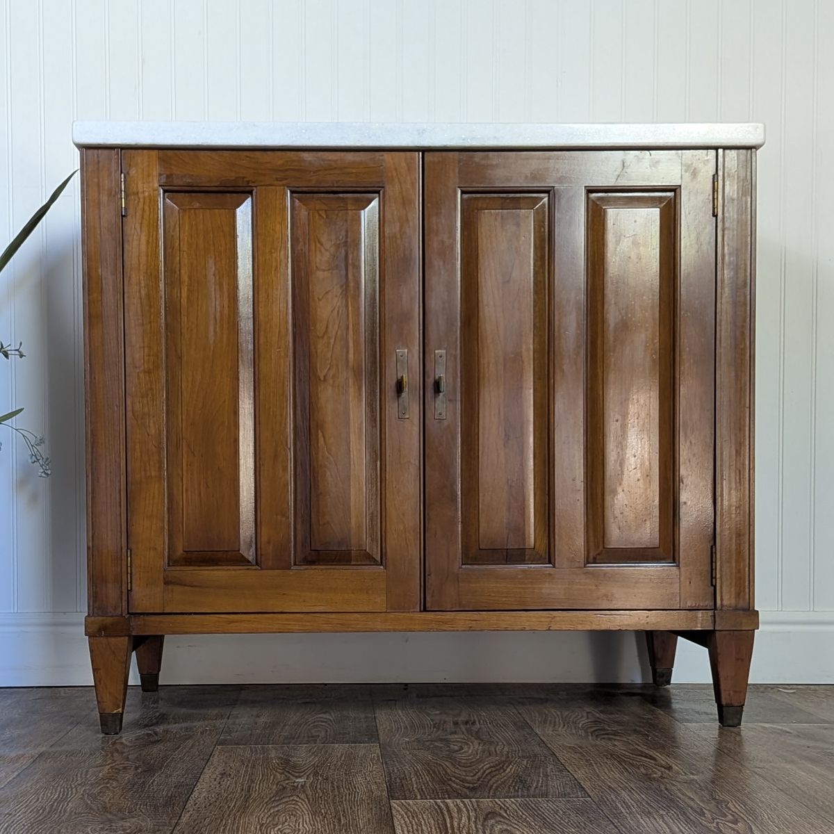 Straight on view of vintage Mid Century Brandt Marble Top Cabinet. 