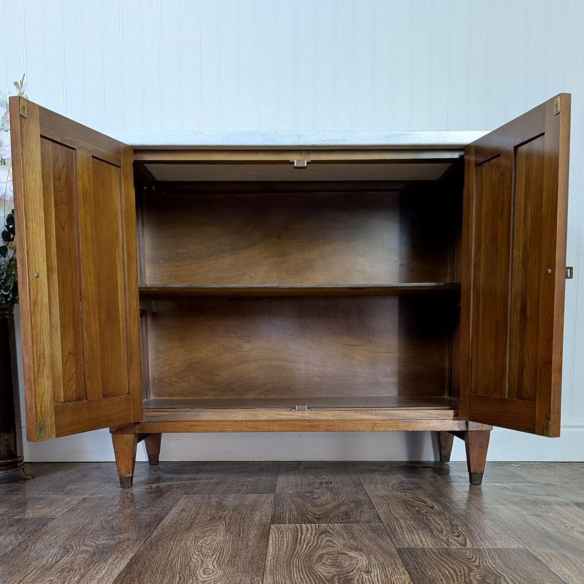 Front view of vintage Mid Century Brandt Marble Top Cabinet with doors open. 